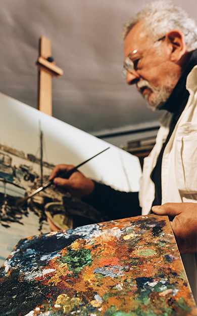man-painting-on-canvas