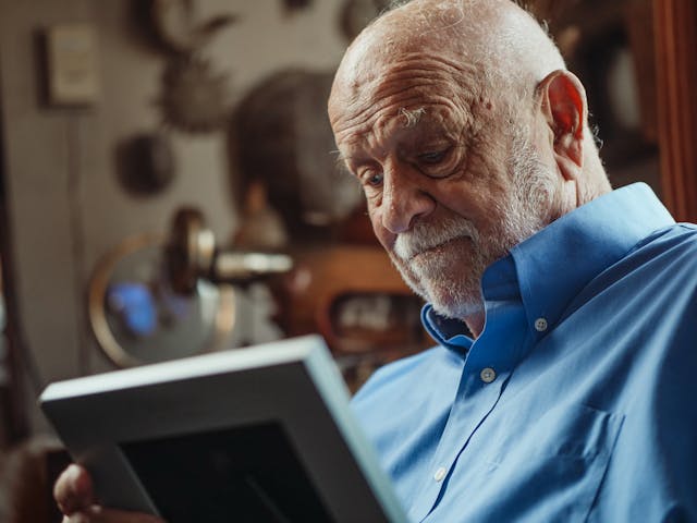 man-looking-at-picture