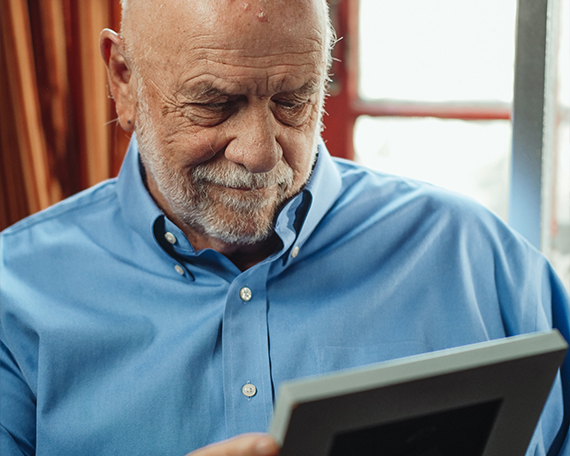 Resident Looking at Photos