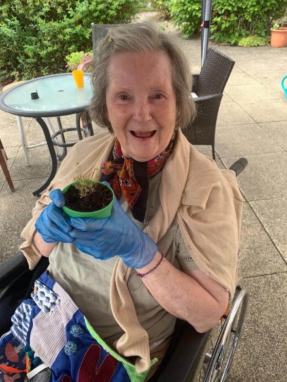 resident-planting-herbs